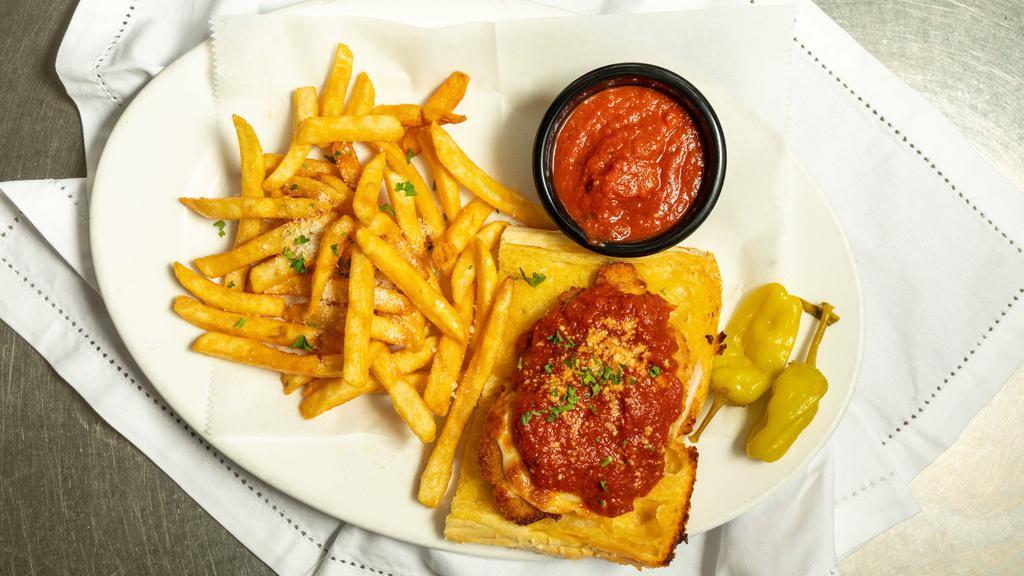 Chicken Parmigiana Sandwich · Hand breaded boneless breast of chicken baked with our house made red sauce & mozzarella cheese.