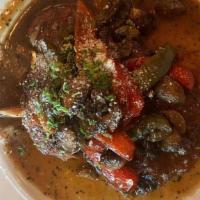 Veal Siciliano · Tender veal slices breaded then sauteed with red & green peppers & button mushrooms served w...