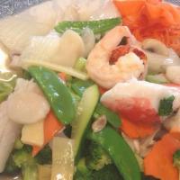 Seafood Delight · Crab meat, squid, jumbo shrimp, and fresh scallop deliciously  sautéed with assorted chinese...
