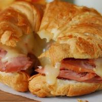 Breakfast Sandwich · Your choice of Ham or Bacon on a croissant or in a wrap with your choice of cheese