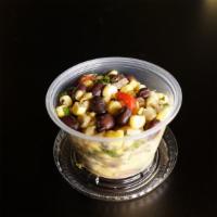 Black Bean & Corn Salad · Vegan. Gluten-free. Black beans, Corn, Onion, Bell Peppers, Garlic, Cilantro, Lime Juice.