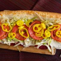 7 Inch Italian Sub · Available in Halal. Salami, ham, cheese, lettuce, tomato, onion, pepper rings, dressing.