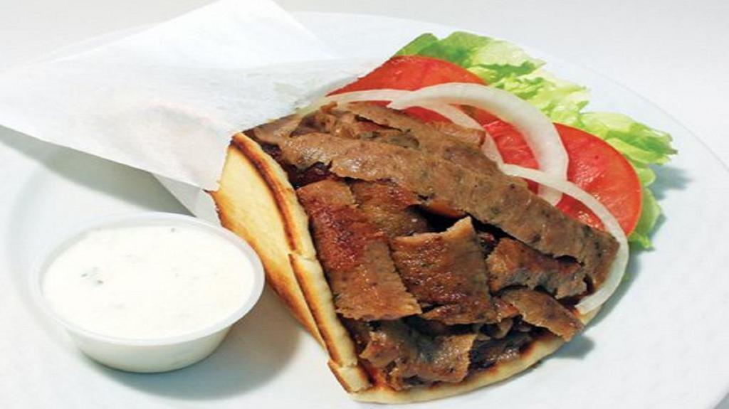 Gyro · Gyro meat, tomatoes, lettuce, onions, and cucumber sauce. Come with a bag of chips.