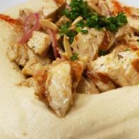 Hommous With Shawarma · Chicken or meat over hommous.