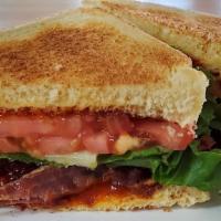 Big Blt · Our blt is made with five slices of bacon, crisp lettuce, juicy tomato slices, and topped wi...