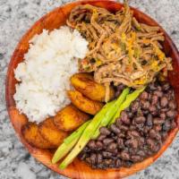 Pabellon Bowl · White rice, shredded beef, black beans, sweet fried plantain, and avocado.