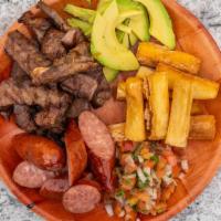 Barbecue Bowl · Grilled beef, avocado, fried yuca, garlic sausage, grilled cheese, and cilantro sauce