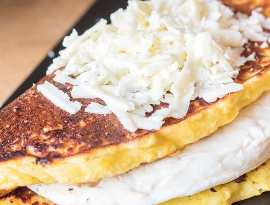 Cachapa · Corn pancake, handmade cheese, panela cheese, and nata.