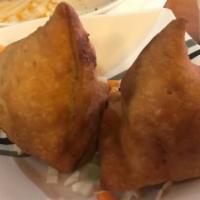 Chicken Samosas · Spicy. Will serve one person. Pastry turnovers stuffed with chicken.