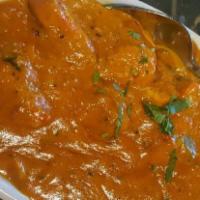 Butter Chicken · Popular. Per person. Chicken with butter, spices, and tomato-cream sauce. Served with rice.