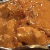 Chicken Vindaloo · Spicy. Per person. Chicken with potatoes and onions in a spicy vinegar sauce. Served with ri...