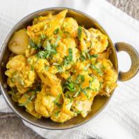Aloo Gobi · Vegetarian. Per person. Potatoes and cauliflower with spices. Served with rice.