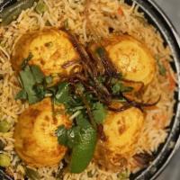 Chicken Biryani · Per person. Fried basmati rice with chicken, vegetables, nuts, and spices.