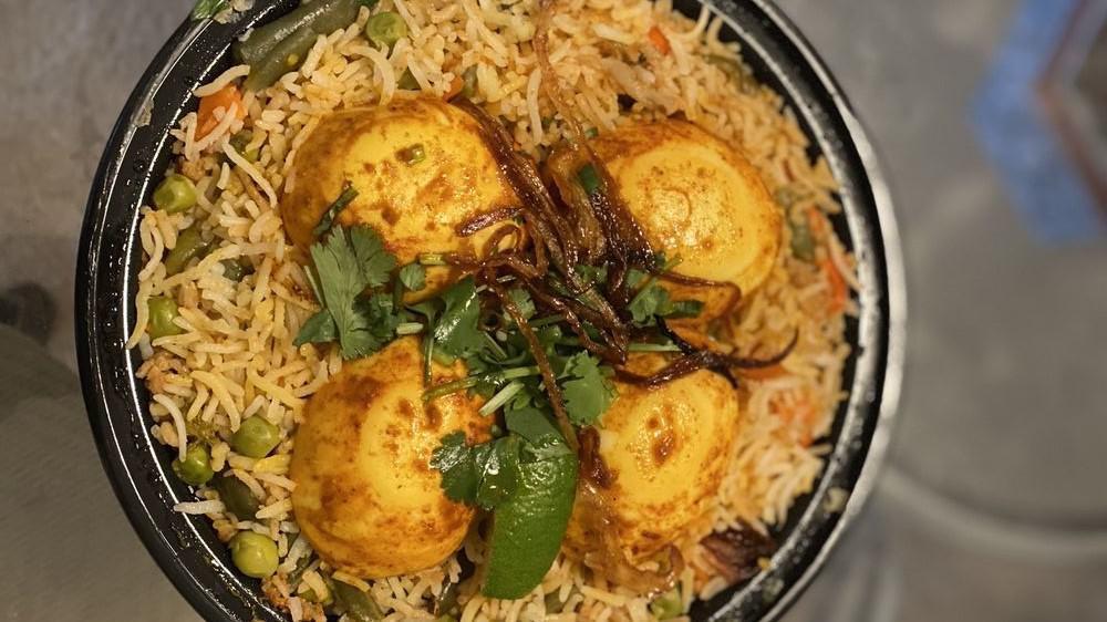 Chicken Biryani · Per person. Fried basmati rice with chicken, vegetables, nuts, and spices.