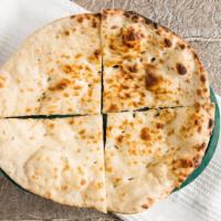 Naan · Vegetarian. We will serve two people. Leavened flatbread cooked in a clay oven.