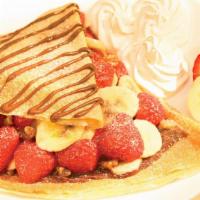 Strawberry Royal Crepe · Fresh strawberry and banana with topping choice: caramel, chocolate or nutella.