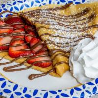 Strawberry & Cream Crepe · Fresh strawberry with topping choice: caramel, chocolate or nutella.
