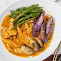 Thai Panang Curry · Green bean, eggplant, mushroom, baby corn and peanut curry, and coconut milk.