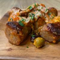 Sausage + Peppers App · house made grill Italian sausage roasted sweet peppers, onion, olives, capers in a delicious...