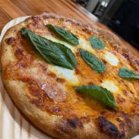 Margherita Pizza · san Marzano blend , mozzarella, garlic, and fresh basil