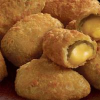 Jalapeno Poppers (5Pc) · Cheddar filled breaded jalapeno peppers, served with ranch
