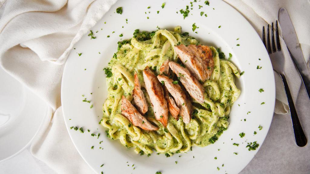 Chicken Creamy Pesto · The Sauce of the Italian Riviera! Fresh Garlic-Basil sauce and rich cream topped with all natural sautéed chicken breast and tossed with our homemade egg fettuccine. Also available in traditional pesto style (without cream).
