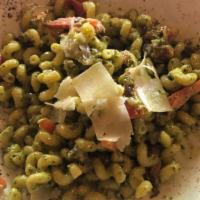 Pesto Cavatappi · Pasta tossed with bacon, pesto,tomatoes parmesan cheese and a touch of cream. add grilled ch...
