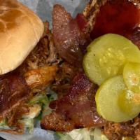 Bbq Bacon Pork · Seasoned Pulled Pork, tossed in House-made BBQ Sauce, w/ lettuce, topped w/bacon, pickle chi...