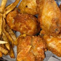 Wing Dings & Fries · 7 wing dings w/ hand-cut fries and a dinner roll