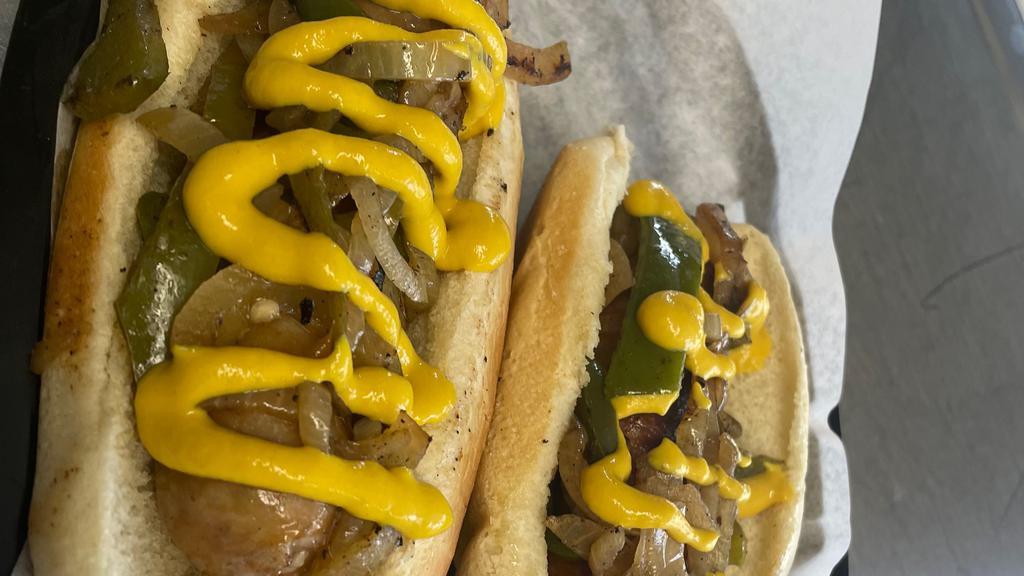 Bratwurst  · Grilled Bratwurst topped w/sautéed peppers & onions and mustard.