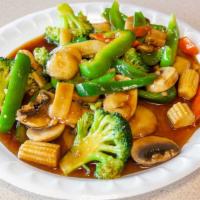 Kung Pao Triple Delight · Spicy. Chicken, beef or shrimp with peanuts, celery, carrot, onion, water chestnuts and bamb...