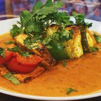 Paneer Tikka Masala · Cubes of homemade cottage cheese roasted on skewer in tandoori oven with bell peppers and on...