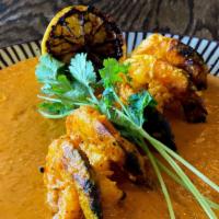 Cognac Flambe Jinga · Marinated tandoori shrimps served over rich creamy flambe sauce.