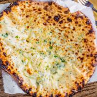 Chili Cheese Naan · Naan stuffed with Mozzarella cheese, Chilies and Cilantro baked in the Tandoor.