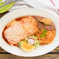 Burrito Suizo · Flour tortilla filled with sour cream, beans, & choice of beef, or chicken. Topped with melt...