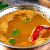 Rasam Soup · Tamarind and tomato juice with spices and garnish.