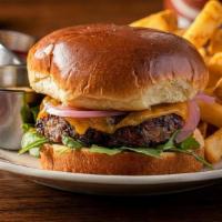 Black Bean Burger · Our Homemade Veggie Burger made with Black Beans, Onions, and Red and Green Peppers. Topped ...