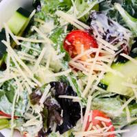 Side Salad · Mixed lettuces, tomato, cucumber, shaved parmesan, and green goddess dressing.
