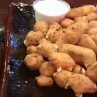Wisconsin'S Jalapeno Cheese Curds · Fried cheese curds with a jalapeño kick, served with ranch dressing.