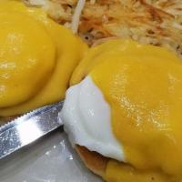 Eggs Benedict · Poached eggs with canadian bacon hand hollandaise sauce.