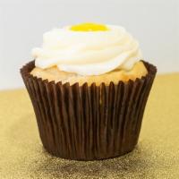 Lemon Drop · Vanilla cake filled with tangy lemon topped with our lemon buttercream and a dollop of tangy...