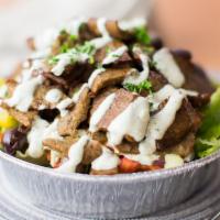 Gyro Salad · Includes lettuce tomatoes onions cucumbers kalamata olives banana peppers and feta cheese. s...