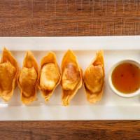 Crab Rangoon (5) · A delightful blend of crabmeat, cream cheese and celery wrapped in thin rico paper, fried to...