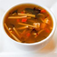 Hot & Sour Soup (Small) · Tofu, bamboo, black mushroom, and carrot simmered in our hot and sour broth, topped with cel...