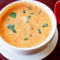 Tom Kha  (Large) · A favorite thai soup, made with lemon grass, galanga, lime leaves, onions, mushrooms, cilant...