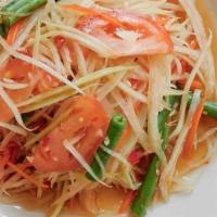 Papaya Salad · Shredded papaya, tomatoes, carrots,string beans, and shrimp (or tofu) tossed in a spicy thai...