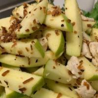 Granny Apple Salad · Thinly sliced granny apples tossed with chicken, cashews, red onions, fried onions, roasted ...