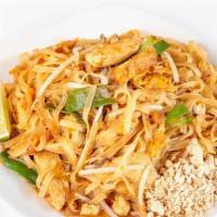 Pad Thai · Thin rice noodles wok tossed with eggs, green onions and bean sprouts, topped with crushed p...