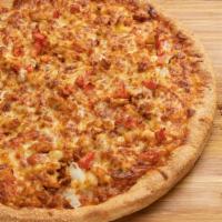 Tikka Masala Pizza · Sarpino's traditional pan pizza baked to perfection and topped with a Tikka Masala Curry sau...