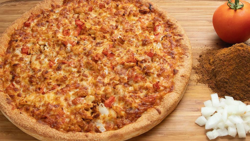 Tikka Masala Pizza · Sarpino's traditional pan pizza baked to perfection and topped with a Tikka Masala Curry sauce, tender chicken , diced onions, diced onions, red pepper flakes, and our signature gourmet cheese blend.
